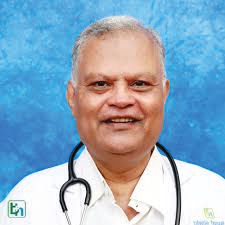 Portrait photo of Dr Nikhil Shah, middle-aged man with glasses and mustache