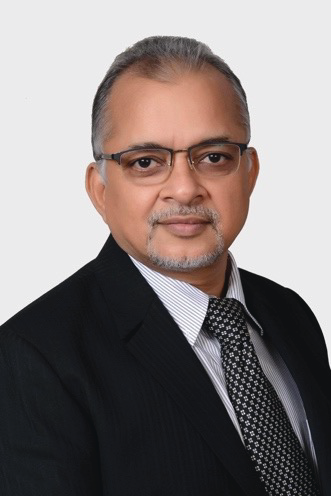 Portrait photo of Dr Sangeet Gawhale, middle-aged man with glasses and short hair