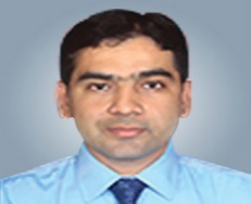 Portrait photo of Dr Jaideep Dhamele, middle-aged man with glasses and mustache