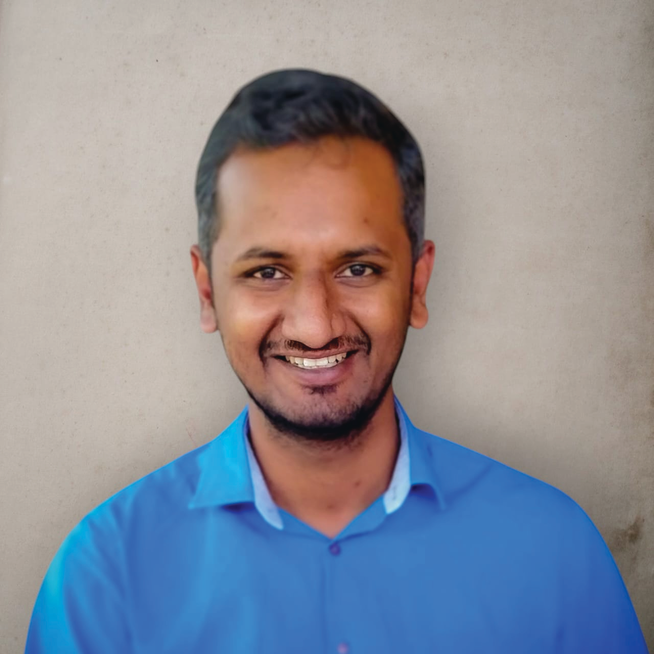 Portrait photo of Dr Vaibhav Shirke, middle-aged man with glasses and mustache
