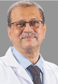Portrait photo of Dr Vikas Agashe, elderly man with glasses and white hair