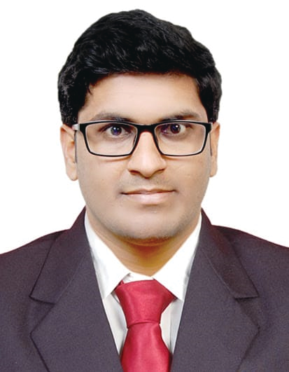 Portrait photo of Dr Adil Summer, middle-aged man with glasses and mustache